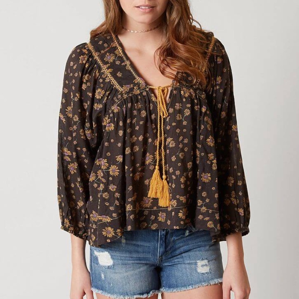 Free People top with tassels
